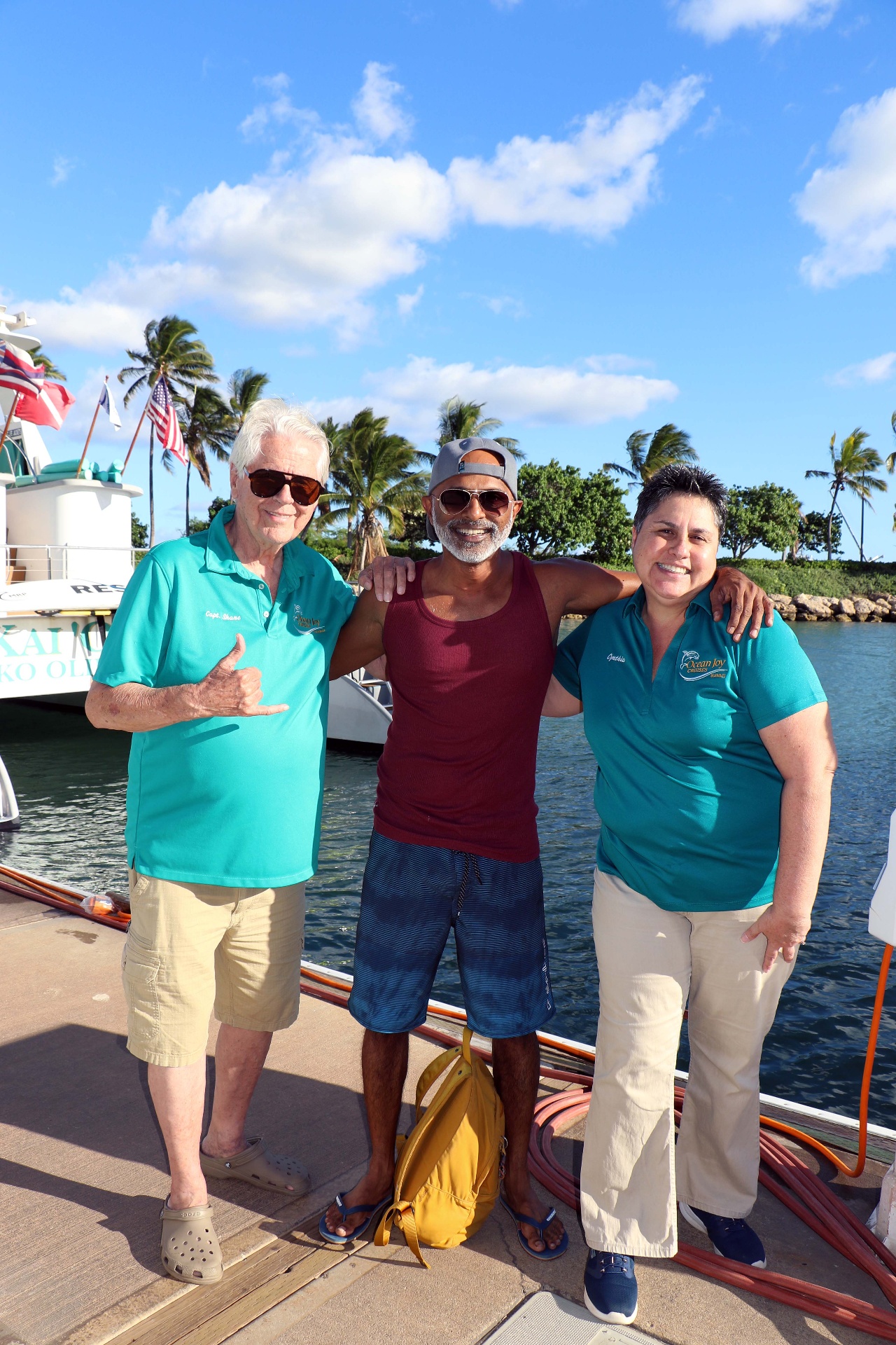 Shree Sadagopan with the Ocean Joy Cruises crew at the dock
